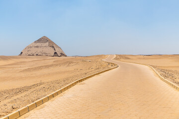 Fototapeta na wymiar Dashur, Egypt; August 24, 2022 - The Bent Pyramid of Sneferu, Dashur, Egypt.