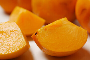 top view of persimmon on white background 