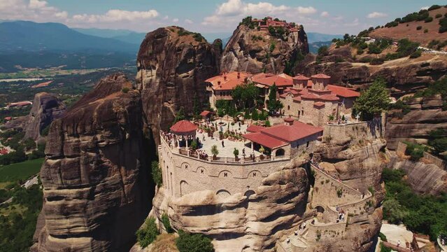 Clifftop Monasteries. Aerial drone shot of the amazingly beautiful monastery. Greek summer holidays. High quality 4k footage