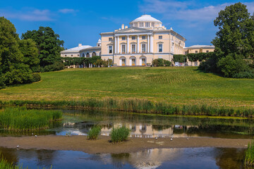 Fototapeta na wymiar Palace of the Russian Tsar Paul I on the bank of the Slavyanka River, Pavlovsk, Russia