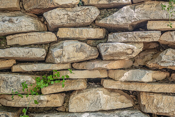 abstract background of an old stone wall close up