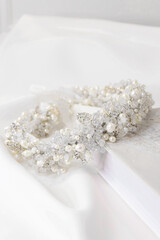 Delicate handmade crystal bridal wreath hair accessory. Wedding concept copy space.