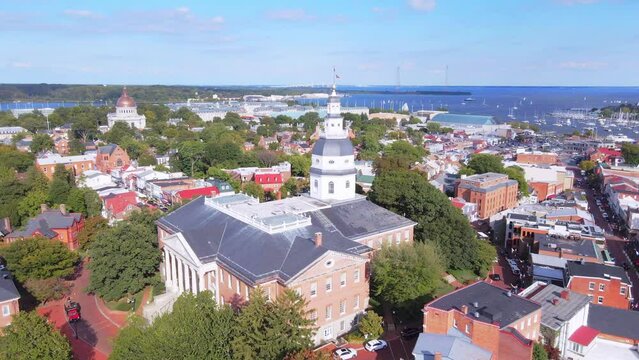aerial drone panning around Maryland state house with city of Annapolis 