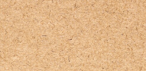 OSB panel, top view. Industrial wall sheet. Plywood brown texture. Cork background. Wood natural grain pattern. Light wood surface. Floor OSB block. Building material board. Loft wall surfaces.