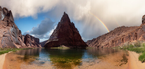 Fototapeta na wymiar Colorado River in Glen Canyon, Arizona, United States of America. American Mountain Nature Landscape Background. Artistic Sky Render with Rainbow. Panorama