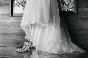 Wedding dress on the background of the window