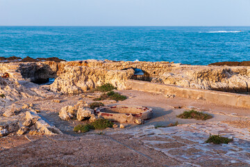 Coastal landscape with ruined stone fortifications