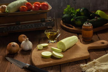 Ingredients for cooking zucchini snacks on a wooden table. Cooking.