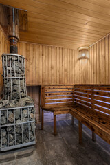 Fototapeta na wymiar Bath, sauna with an oven filled with stones