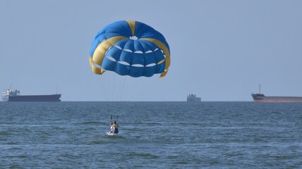 Holidays on the sea coast, balloon flight over the sea, the concept of extreme sports, tourism and travel