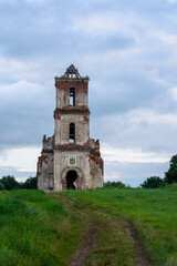 Fototapeta na wymiar Ruins of the Trinity Church in village of Belaya Tserkov Belarus. Lake Chereiskoye in Chereya village. Travel concept background.