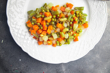 mix vegetables cut cubes beans, peas, green beans, carrots, celery Macedonian vegetables bunch of juicy vegetables fresh dish healthy meal food snack diet on the table copy space food background 