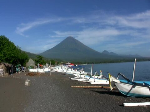 View of the Agung volcano from the beach in Amed, Bali