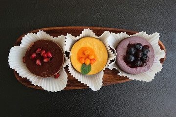 Sugar-free vegan cakes on wooden plate