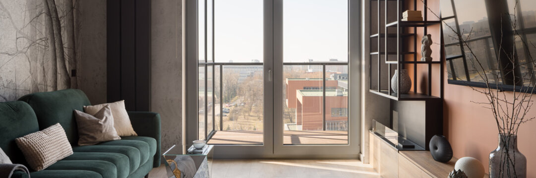 Balcony window in stylish living room, panorama