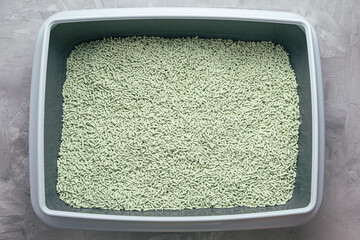 Cat litterbox with natural flushable biodegradable tofu litter with green tea powder fragrance....