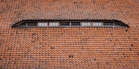 row of small attic windows 