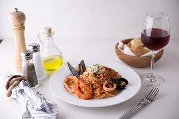 Spaghetti alla pescatora with wine