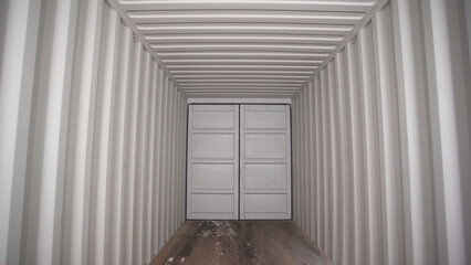 Inside large shipping container. Stock footage. View from inside locked cargo container with white...