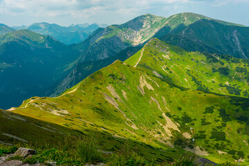 Fototapeta na wymiar Beautiful view of the Tatra Mountains landscape. View of the mountains from the top. High mountain landscape.