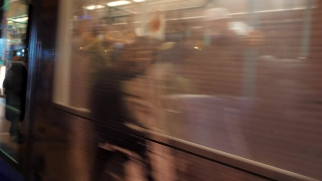transport in Istanbul. At night, a tram with people passes by. New wave covid