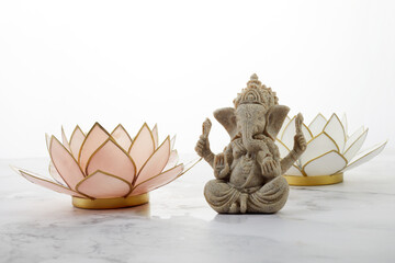 Happy Ganesh Chaturthi festival, Lord Ganesha statue with lotus on marble background, - obrazy, fototapety, plakaty