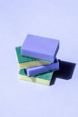 sponges for dishwashing close-up on purple