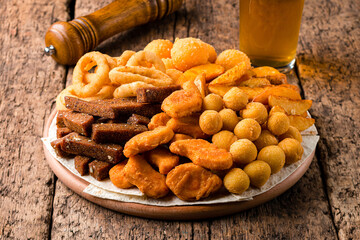 Large beer set of french fries, chicken nuggets and onion rings