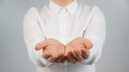 Close-up of female hands with palms up. 