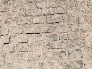 texture, background, asphalt brick. stone for road construction. the stones are plastered with a white coating for roadworks. 3d volumetric texture