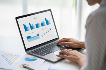 Crop shot of woman hand works on laptop Bookkeeper or financial inspector hands with copy space...