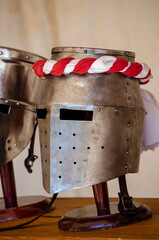 medieval knight helmets as props at a historical reenactment festival