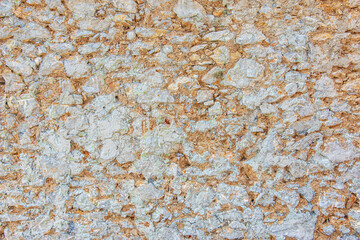 The texture of the stone wall. Background texture of the stone wall of the old building. Stone wall as background or texture.