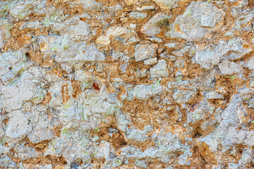 The texture of the stone wall. Background texture of the stone wall of the old building. Stone wall as background or texture.