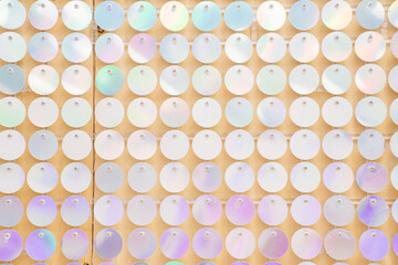 a wall with shiny sequins. glitter and shimmer.