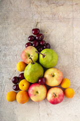 fruits folded in a triangle on vintage paper, selective focus
