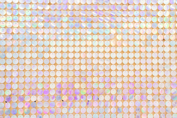 a wall with shiny sequins. glitter and shimmer.