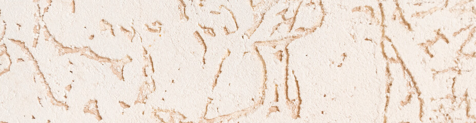 Close-up of white plaster. Cream color. Texture.