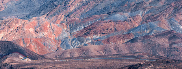 Colorful red rock hills in Death valley national park, California.