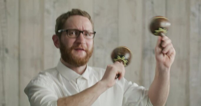attractive office worker dancing with maracas
