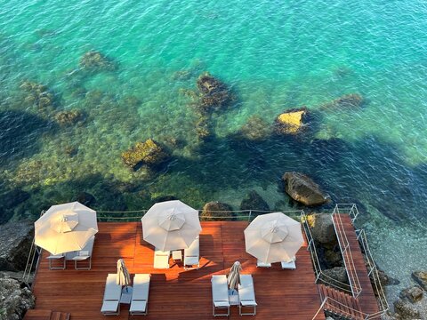 Paradise beach in turquoise clear sea at summer. Relax. Vacation. Happiness.