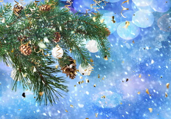 Christmas tree branch with coins on gold text  blue snowy blurred background template copy space banner greetings card