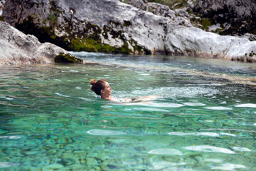 Swiming in Emmerald Green Rivers in Slovenia