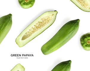 Creative layout made of green papaya on the white background . Flat lay. Food concept.