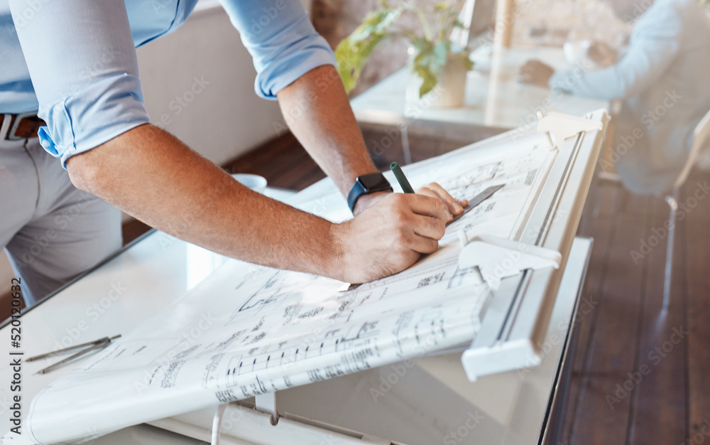 Poster architect drawing a plan for a building project inside his office. closeup of a male engineer doing 