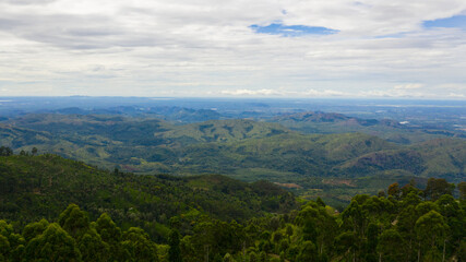 Fototapeta premium Aerial view of Mountains with rainforest and clouds. Sri Lanka.