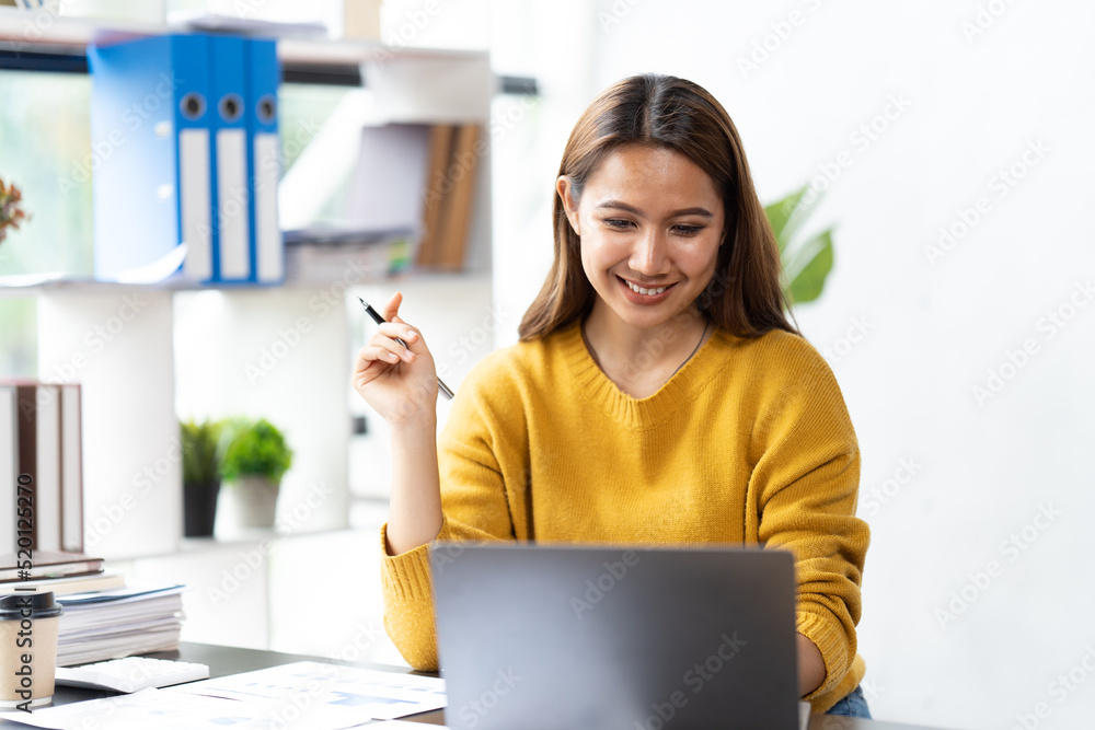 Wall mural Portrait of smile beautiful business asian woman working office desk computer. Small business sme people employee freelance online startup marketing designer telemarketing successful.