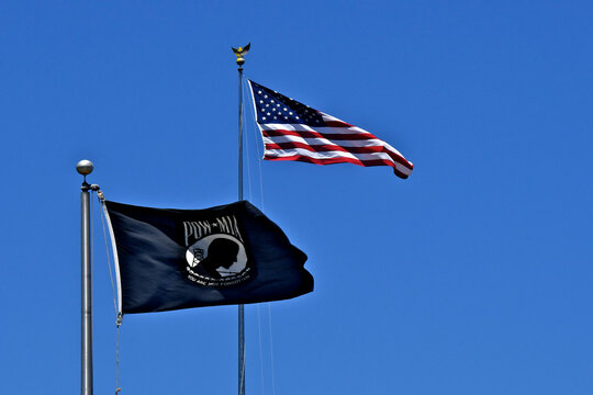 The American flag and POW MIA flag displayed at the Golden Gate National Cemetery, the final resting place for our Armed Forces Veterans in San Bruno, California