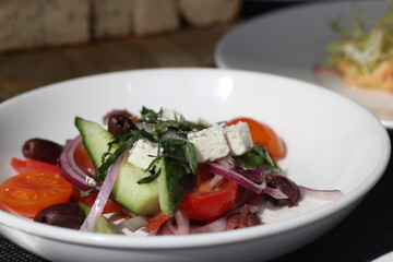 Salad with cheese and tomatoes