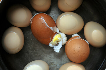 Broken Unhappy Egg in saucepan